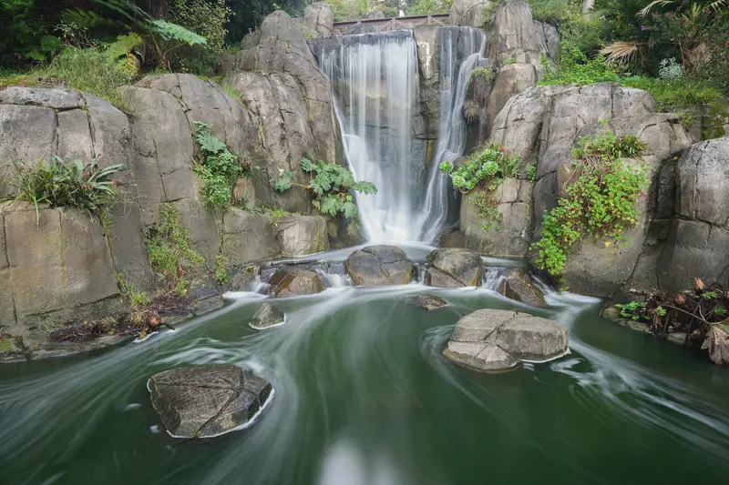 Photo of Huntington Falls tumbling over rocks in Golden Gate Park